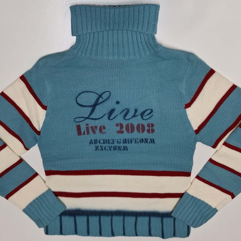 Sweterek dziewczęcy akrylowy niebieski golf firmy Ping model N52291