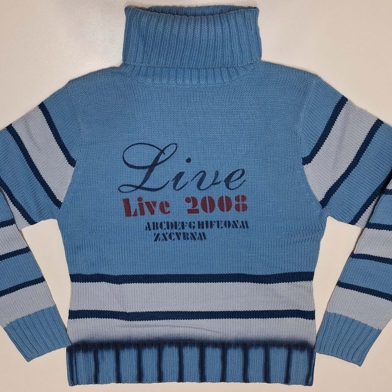 Sweterek dziewczęcy niebieski akrylowy golf firmy Ping model T52291